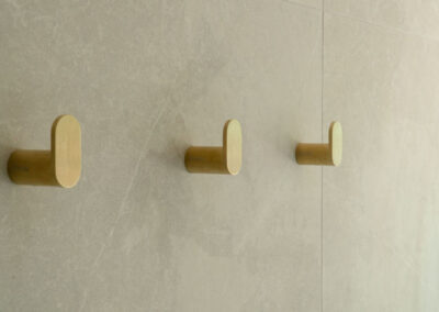 gold towel holders in this bathroom renovations in Owenia St Algester