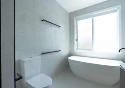 white and black bathroom renovations